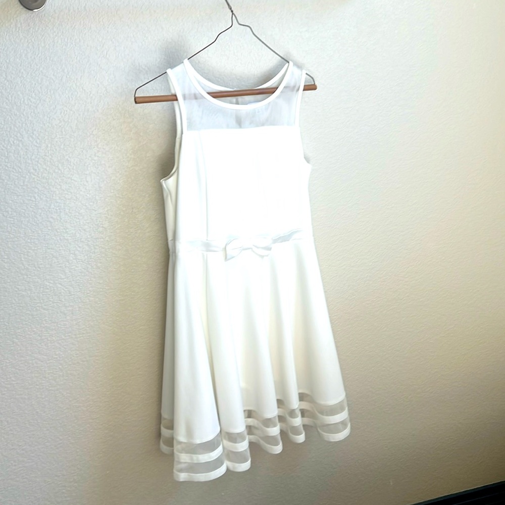 Beautiful Girls white dress, lined chest, sleeveless, knee length.
